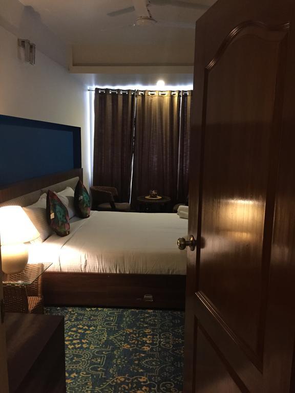 Luxtay Suites บังกาลอร์ ห้อง รูปภาพ