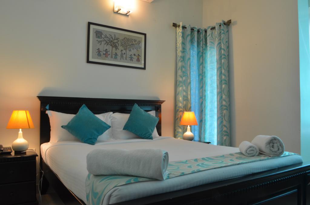 Luxtay Suites บังกาลอร์ ห้อง รูปภาพ